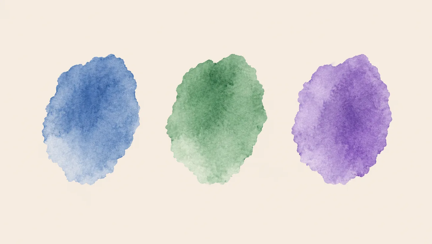 Watercolor colour samples in blue, green and violet.